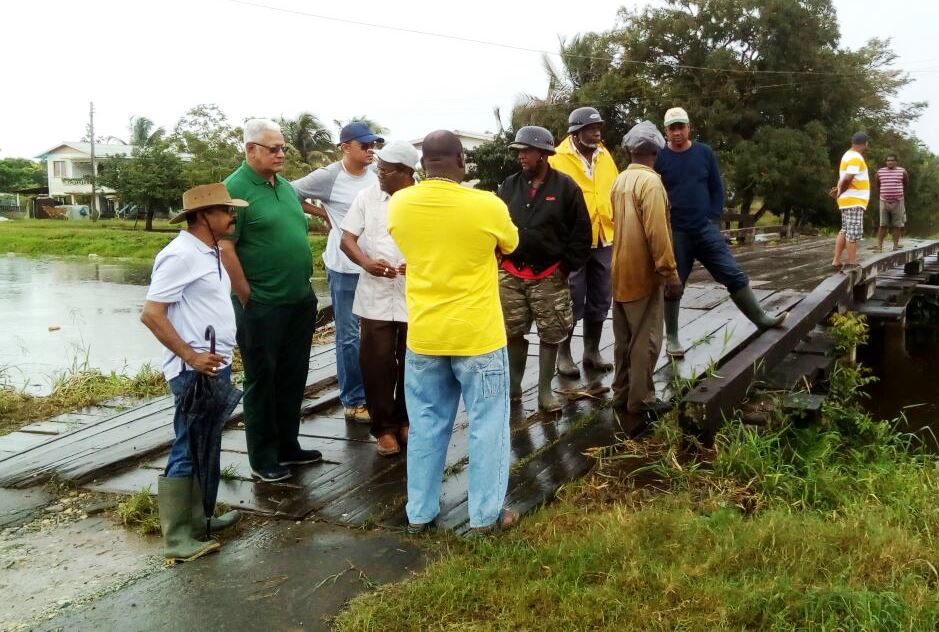 Minister and the team interacting with flood affected persons during the outreach