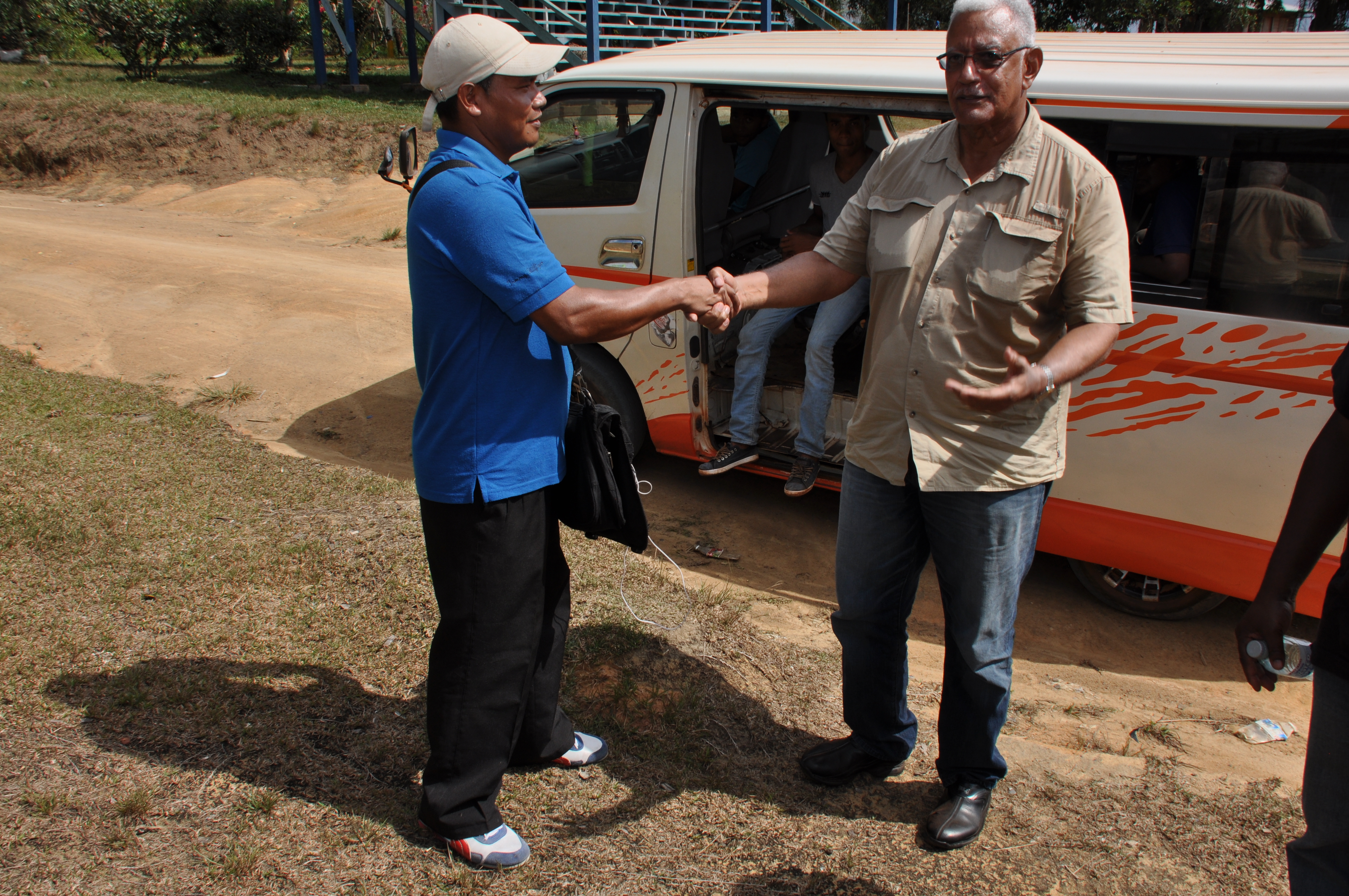 Hon. Noel Holder, Minister of Agriculture, meeting with Mr. Cleveland De Souza, Toshao of White Water Creek village.
