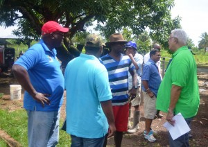 Agri. Minister Noel Holder, GLDA CEO Mr. Nigel Cumberbatch while engaging farmers during the outreach