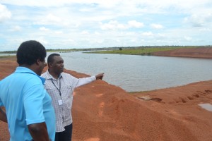 ceo-of-ndia-mr-freddy-flatts-in-discussion-with-fao-representative-at-water-harvesting-site-in-region-9