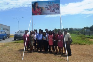 staff-of-the-ptccb-infront-of-the-newly-erected-billboard