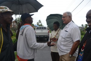 Minister Holder and Team interacts with villagers at Buxton, East Coast Demerara 