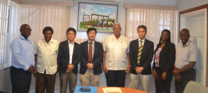 Agri. Minister flanked by JICA Consultants and other officials