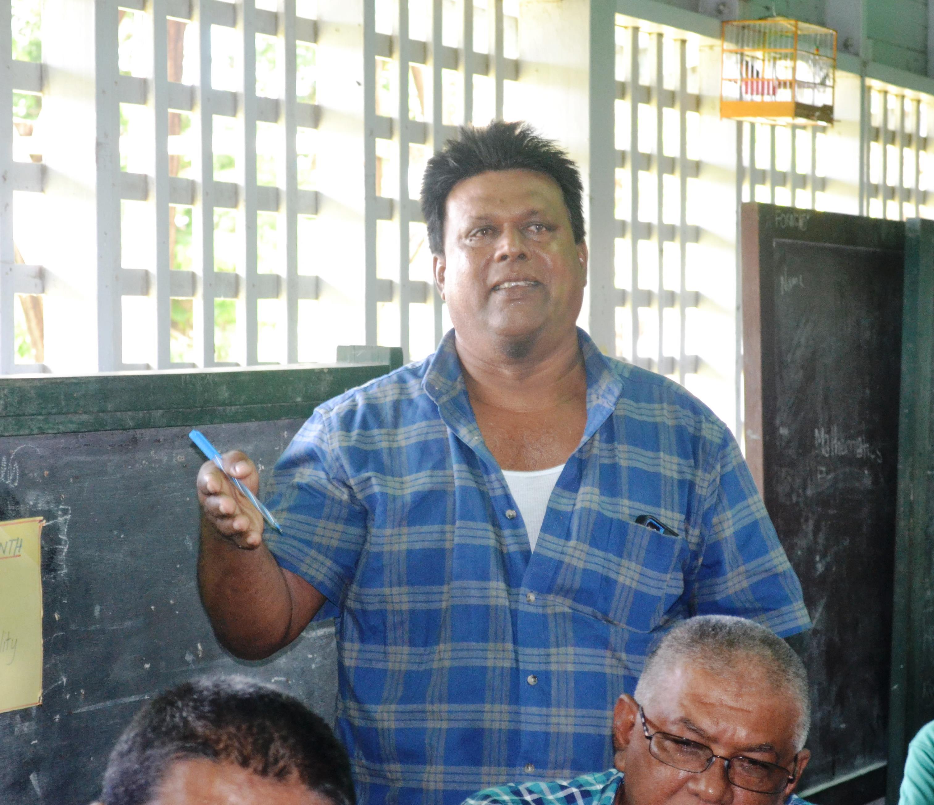 Seerpaul Hemraj, a rice farmer while offering his thoughts on aerial spraying