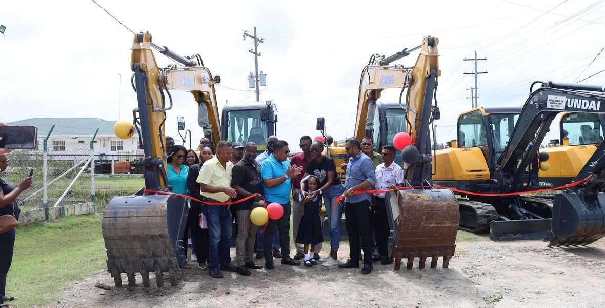 Agri. Minister hands over four mini excavators to NDCs in Reg. 5